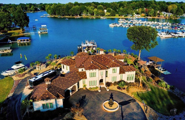 Spacious Lakefront Home with private pool, huge dock and amazing amenities!