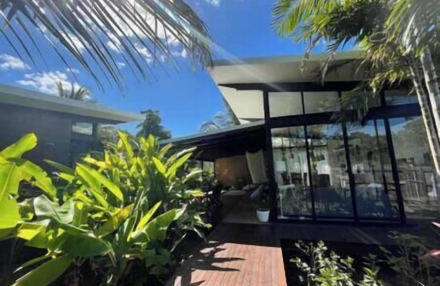 Tropical Modernis Retreat is set up as a contemporary beach abode