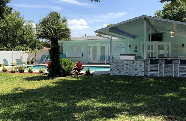 Tropical pool home with big backyard, close to beach, high and dry, never floods