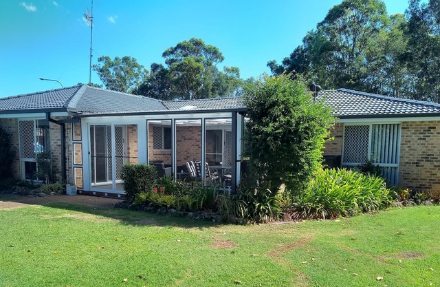 Tuncurry By The bush