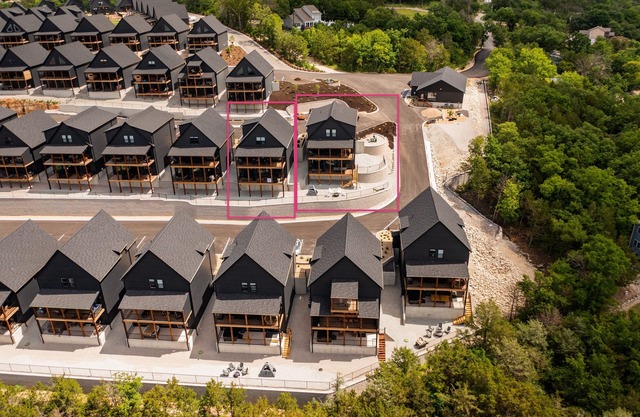 Two homes (sleeping 51) golf simulator, outdoor sauna, hot tub & fire table