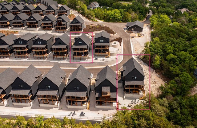 Two homes (sleeping 51) golf simulator, outdoor sauna, hot tub & fire table