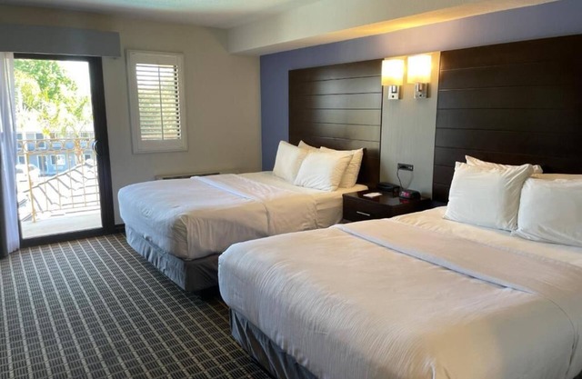 Family Room with 2 King Bed & a Sofa Bed