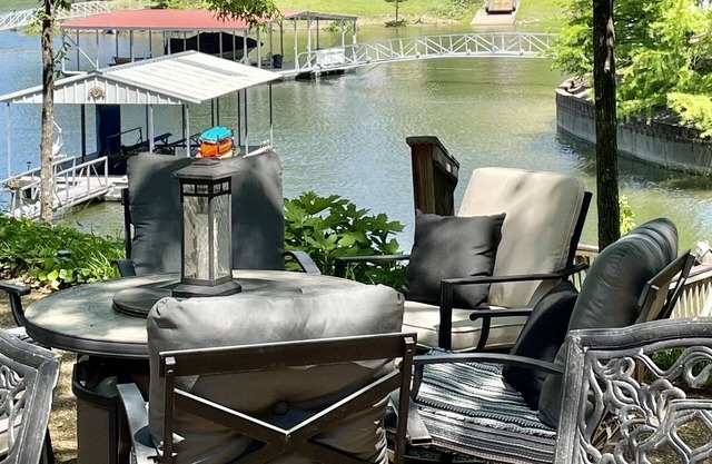 Lakefront House + Guest cottage! Boat dock, hot tub, wi-fi and close to stores!