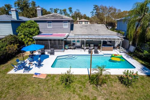 Ultimate Beach Getaway · Mins from Beach · Hot Tub · Heated Pool · Game Room