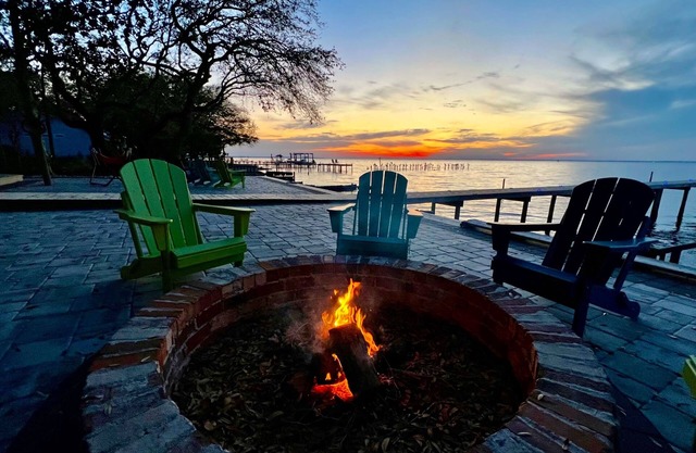 Unique waterfront home with a dock, WiFi, washer/dryer, firepit, & central A/C