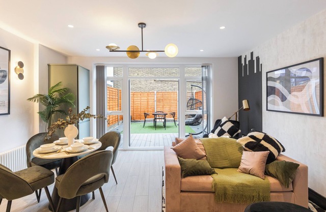 Unwind in Style: 2BR with Cozy Backyard for Groups
