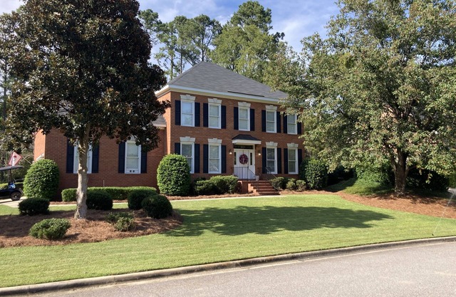 Updated and clean Masters rental in a gated, golf community