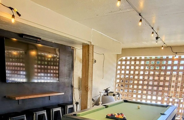 Updated beach house with private pool, hot tub, and community fitness center!