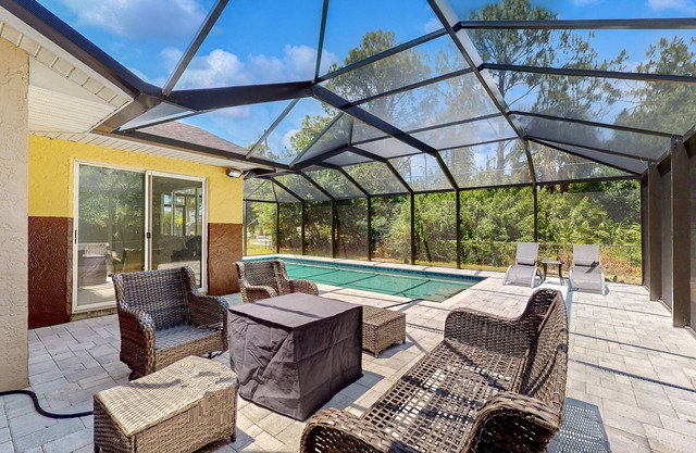 Updated home with large fenced yard, grill, patio & new interior - dog-friendly