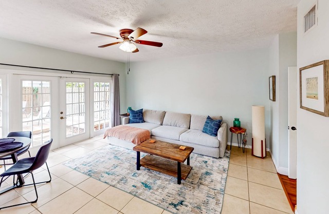 Updated townhome in the heart of South Tampa with fenced yard, deck, & W/D