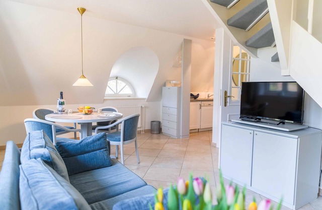 Upper floor apartment on 2 levels, up to 4 persons, with beach chair in the garden