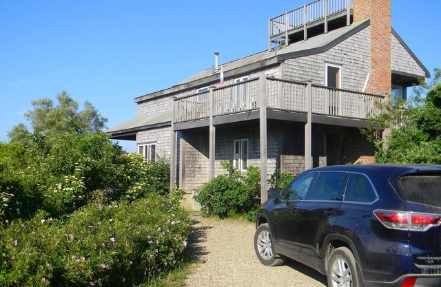 Maison à l'envers près de la plage avec vue imprenable sur la lande et l'océan