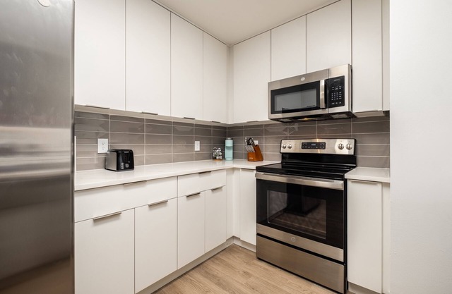 Uptown's Elite- 4BR Luxury Oasis