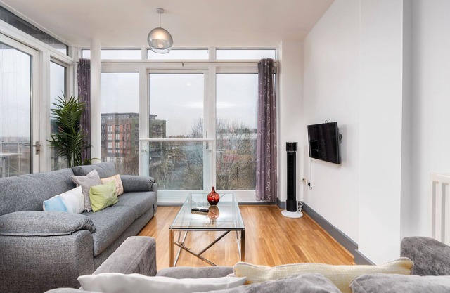 Urban Oasis: Garden Views, Balcony, Free Parking