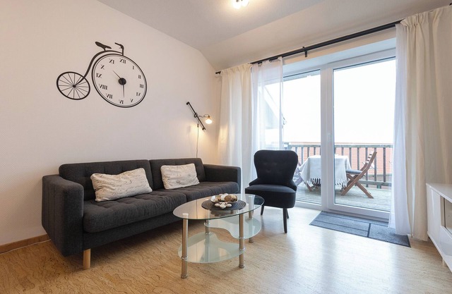 Vacation apartment Wremer Bogen 9-3-6. High above the dyke and with charm.