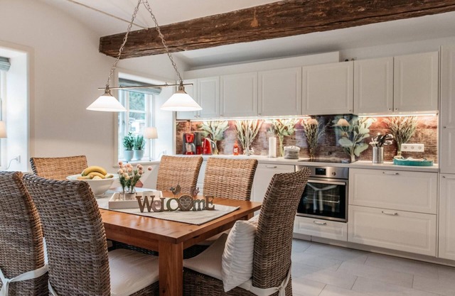 Appartement de luxe dans une chaumière avec terrasse privée et jardin pour 4 personnes