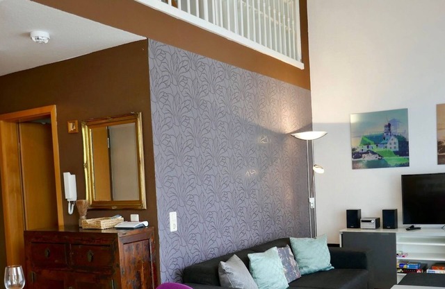 Grand duplex de 2 chambres avec un grand balcon et une place de parking privée