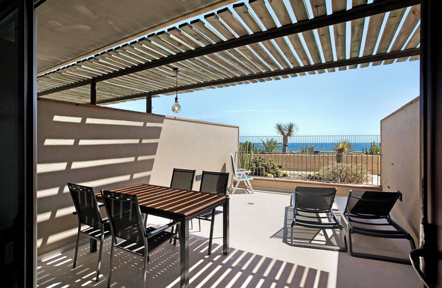 Appartement de vacances 'Casa Médano 5 En El Médano' avec vue sur la mer, terrasse privée et Wi-Fi