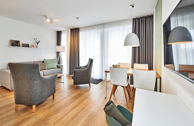 Vacation apartment close to the beach with large balcony incl. use of swimming pool & sauna - Deichhäuser Anna