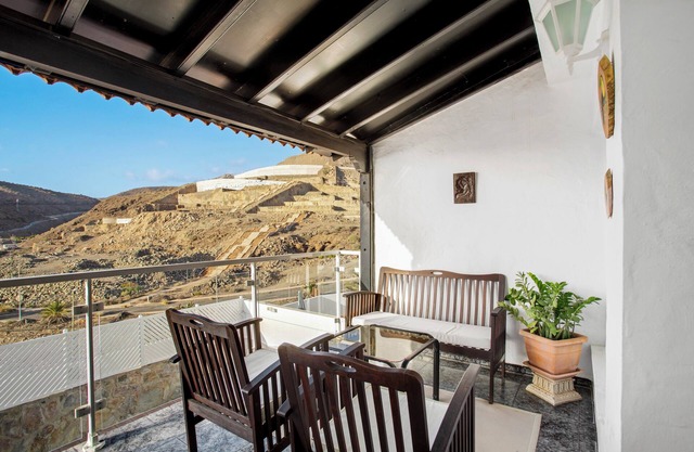 Appartement de vacances 'Casa Los Caideros' avec vue sur la mer, piscine partagée et Wi-Fi