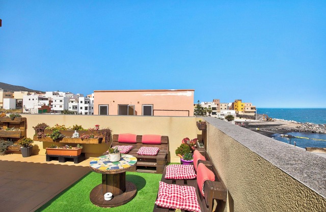Appartement de vacances 'Estudio Calima' avec vue sur la mer, terrasse privée et Wi-Fi