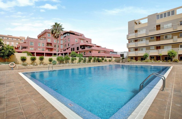 Appartement de vacances 'La Perla D22 En El Médano' avec piscine partagée, balcon et Wi-Fi