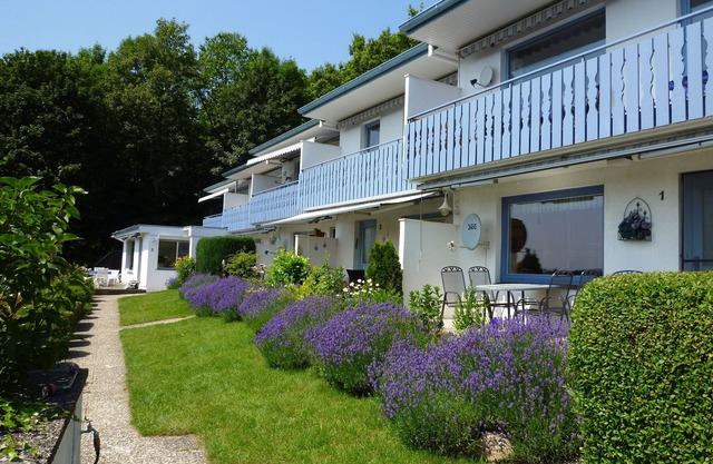 Appartement confortable, idéalement situé sur une pente, avec une vue fantastique sur le lac