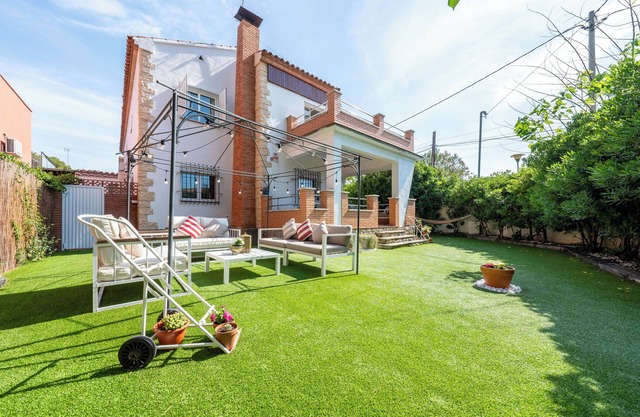 Maison de vacances '50 M to the Beach' avec terrasse privée, Wi-Fi et climatisation