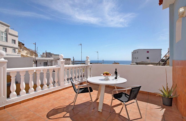 Maison de vacances "Atico Las Arenas" avec vue sur mer, terrasse privée et Wi-Fi