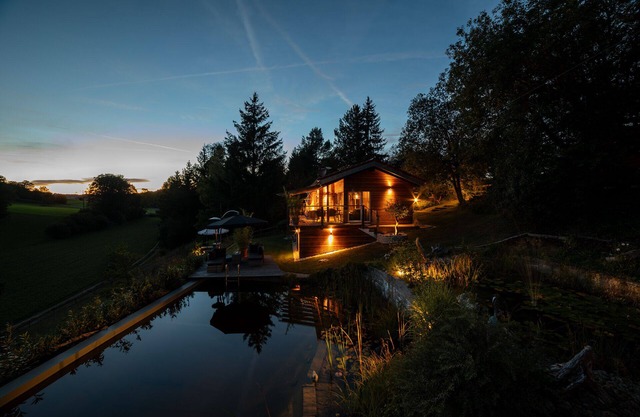 Vacation home in the Schwabische Alb with swimming pond and sundeck.
