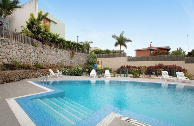 Maison de vacances 'La Quinta Adosado' avec vue sur mer, piscine partagée et Wi-Fi.