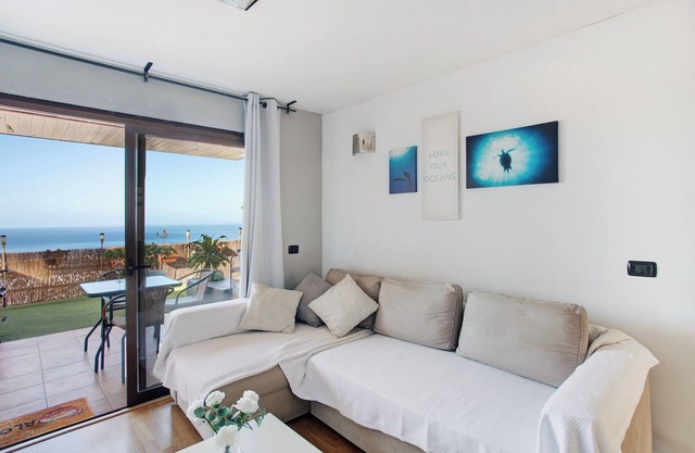 Maison de vacances "Sunset" avec vue sur la mer, piscine partagée et Wi-Fi