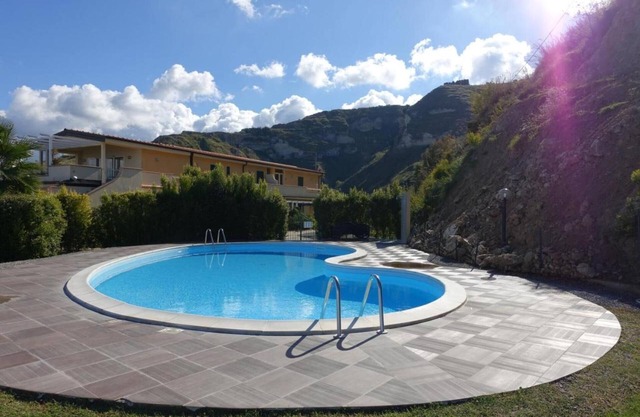 Maison de vacances "Terrazzo A9" avec vue sur mer, piscine partagée & Wi-Fi