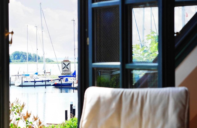 Vacation home "Das Hafenhaus" in Lemkenhafen - with roof terrace and fantastic sea views