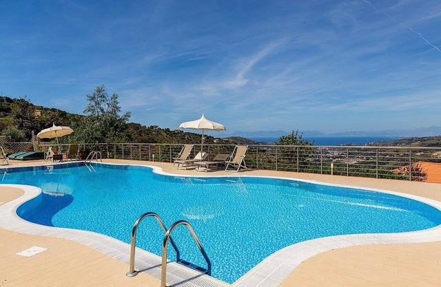 Villa Albatros D: Un cottage caractéristique et accueillant entouré de verdure.