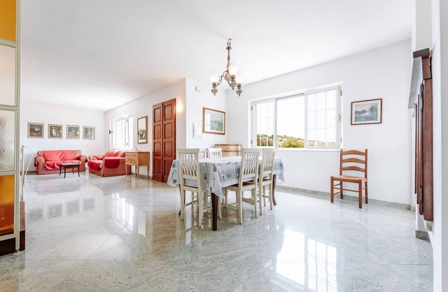 Villa 'Casa Antonietta' avec terrasse privée et jardin partagé
