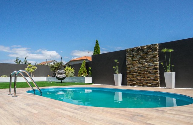 Villa con piscina a pie de playa