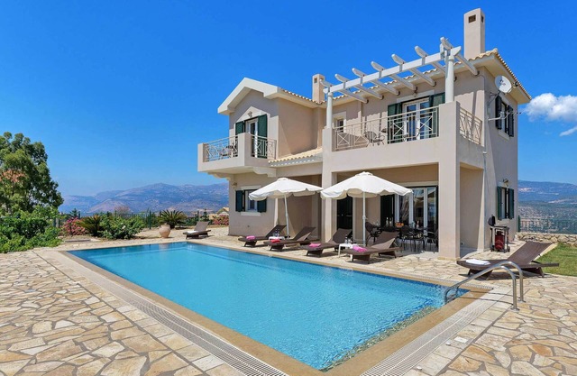Villa Kalithea - Cette villa comprend une terrasse ouverte avec vue panoramique sur la mer