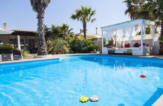 Villa Tentazione: Une villa agréable et spacieuse située à une courte distance de la plage.