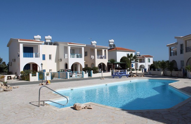 Villa avec piscine communautaire