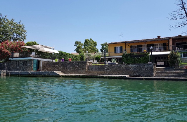 Villa with jetty on Magra river