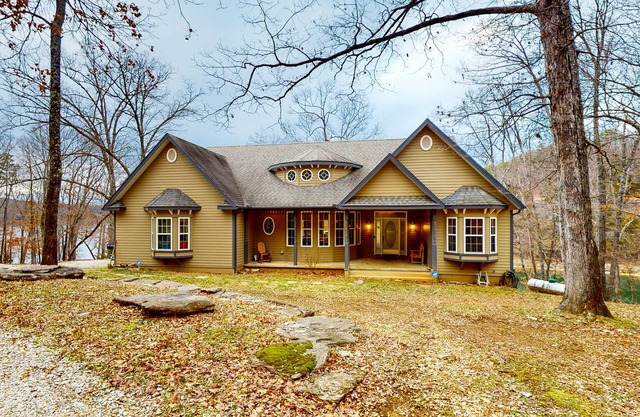 Vintage 2-story lakefront home with fireplace, pellet smoker, firepit & decks