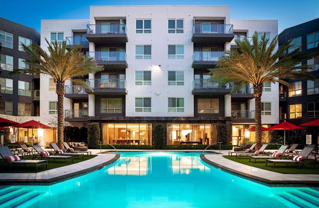 Vora LUX – Elegant 1BRs with quartz kitchens, smart tech, and resort vibes.
