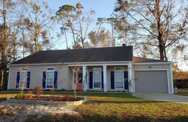 Walk to beach in minutes! Golf cart to town! Private deck for dining, fire pit!