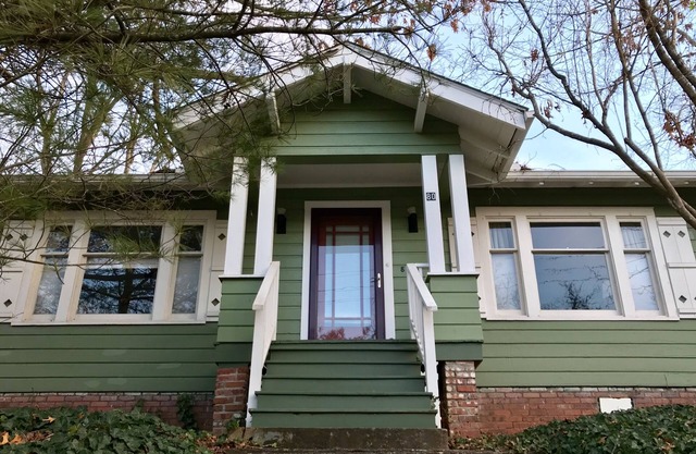 Marcher jusqu'au centre-ville depuis un charmant cottage, dans le quartier historique de Montford, séjour minimum de 30 jours