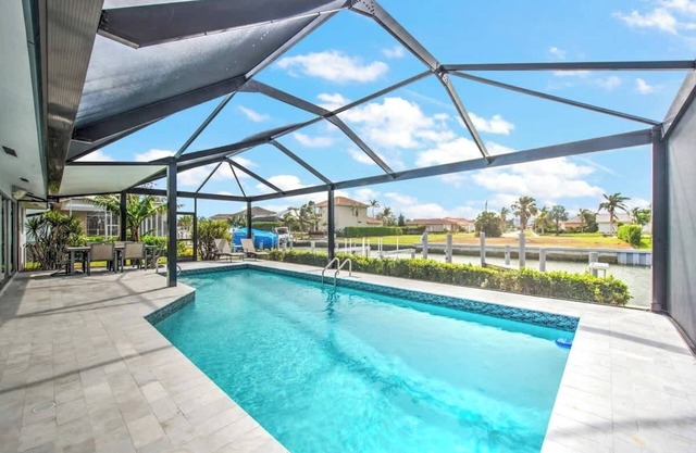 Walking Distance to the Beach! Canal / Pool Home!