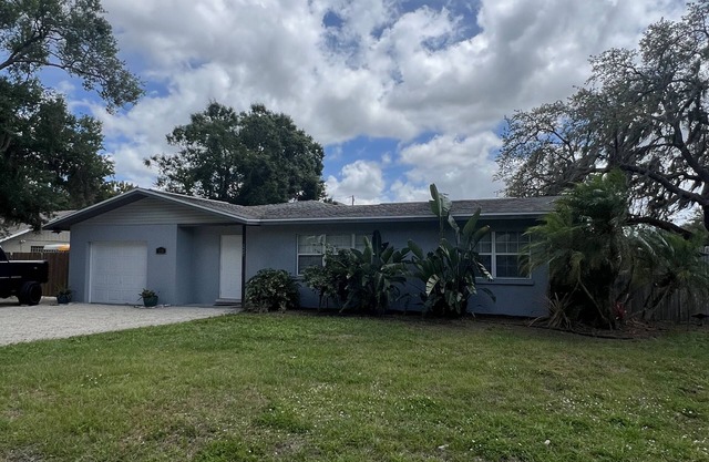 Walking distance to shopping, centrally located fenced in 4 bedroom home