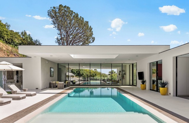 Warm Modern Masterpiece prime Trousdale Estates with beautiful city views.