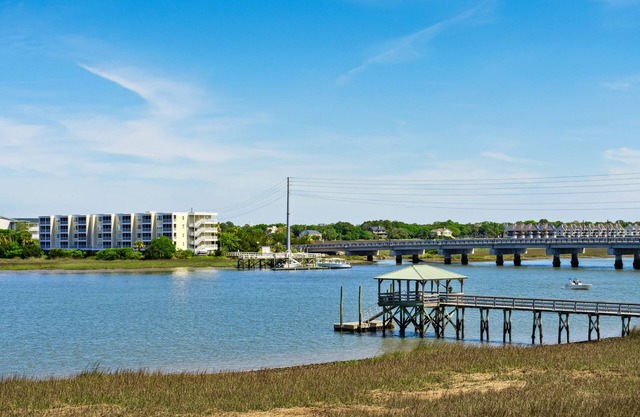 Water's Edge 114 - River Daze - Premier Riverfront Townhome - Pool & Fishing Pier!